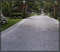 Stamped Concrete Driveway in London Cobblestone with rolled curbs